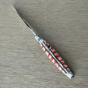 Laguiole en Aubrac Handcarved Plates Multipurpose Knife, Red Mollar Handle, 4.75 inches