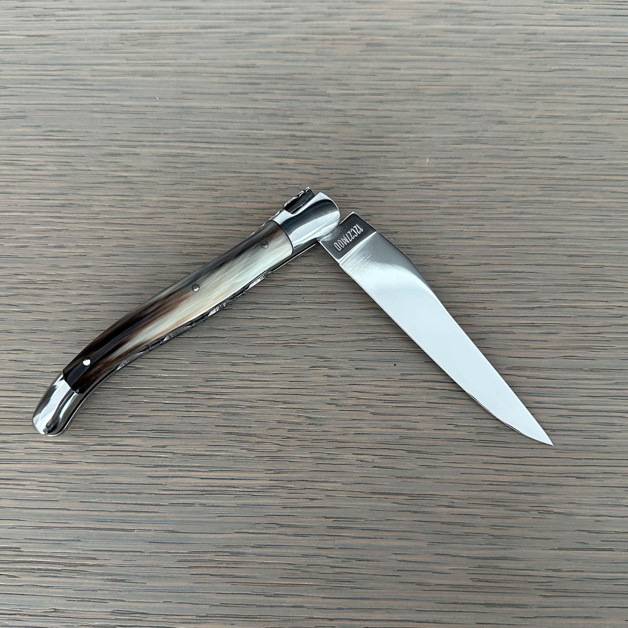 Laguiole en Aubrac Double Plated Folding Knife with Shiny Bolsters, Solid Horn Handle, 4.75"