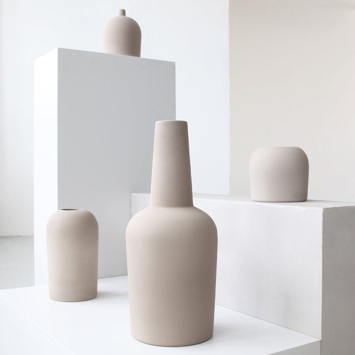 Dome vase collection with neutral gray terracotta vases
